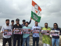 भोपाल में पानी की टंकी पर चढ़े युवा कांग्रेस कार्यकर्ता, मांगा अमित शाह का इस्तीफा